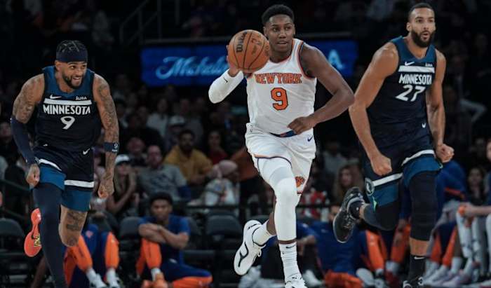 RJ Barrett (center) had a busy Saturday night for the Knicks